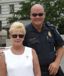 Beverly Perlson, founder of Band of Mothers, with Capitol Policeman