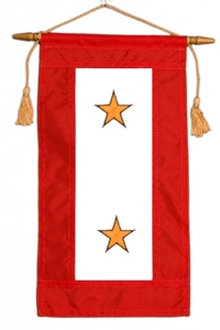 Service flag with two gold stars, representing two family members who died on active duty.