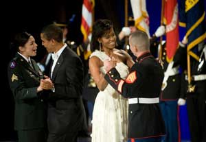 President Obama and the First Lady dance with service members at the Commander-in-Chief Inaugural Ball.
