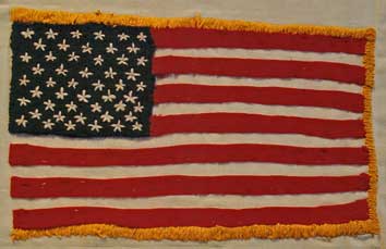 American POW's in Vietnamese prison camps fashioned hand-made American flags from whatever threads they could find.
